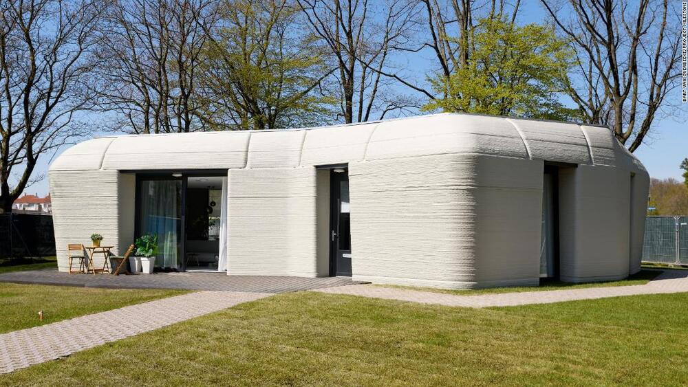 a-boulder-shaped-house-made-from-3d-printed-concrete-is-ready-for-its-first-tenants