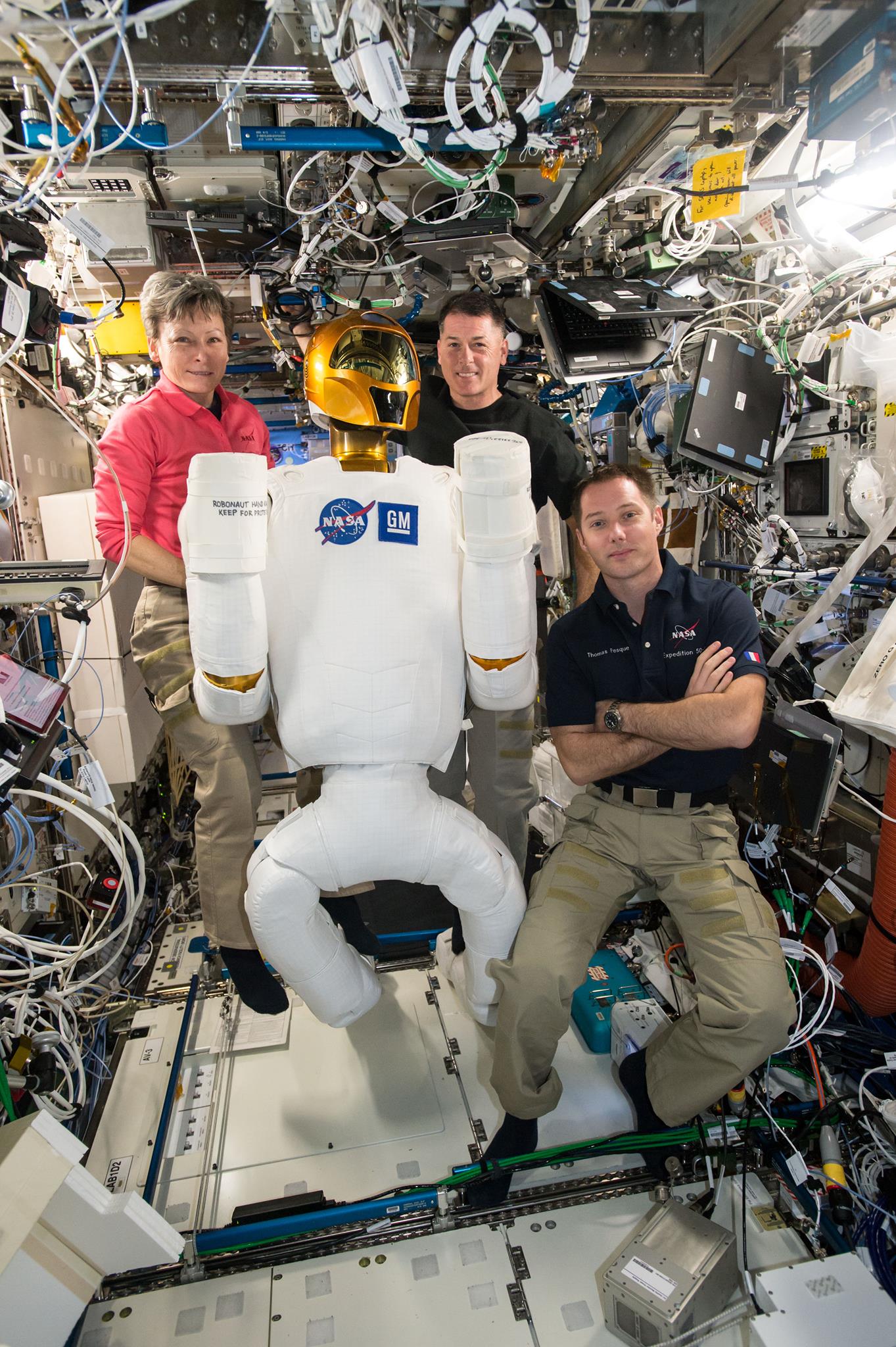Astronauts aboard the International Space Station remotely ...