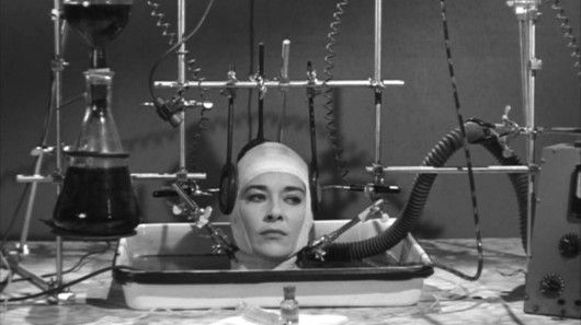 A woman's severed head awaits a new body, in the 1962 film The Brain That Wouldn't Die 