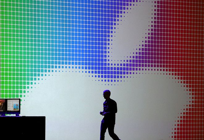 Apple CEO Tim Cook walks off stage after this year's WWDC presentation.