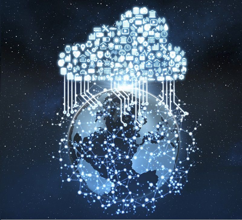 Cloud shaped set of icons with symbols of services and activities connecting planet Earth, floating in the outer space, surrounded by a complex network of glowing nodes linked by bright lines, extending in the deep blue space around the globe. Global business and communication technology connecting everything through cloud computing and the Internet of Things. Dark blue background.